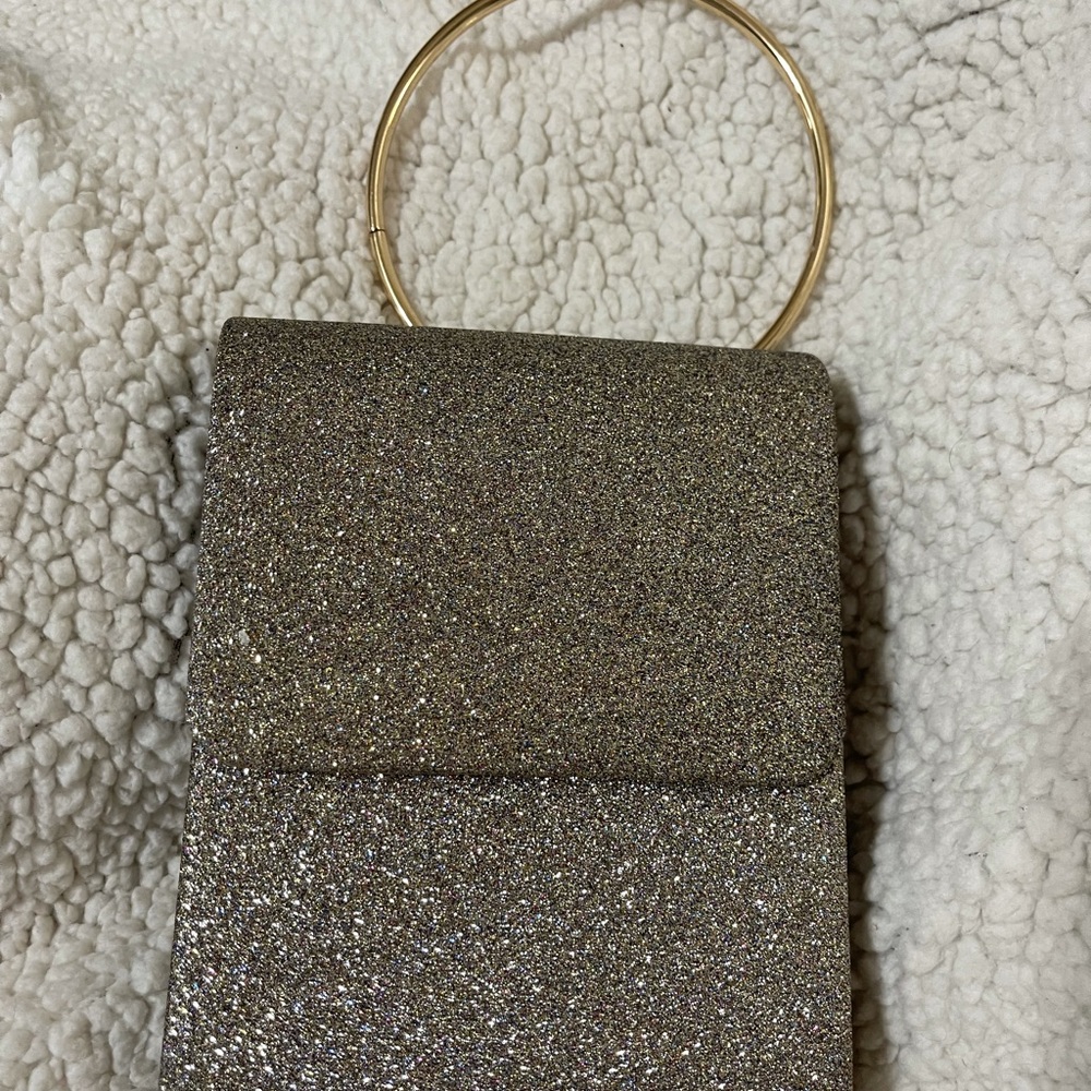 Silver glitter evening clutch